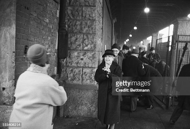Berlin, Germany- West and East Berliners embrace as they meet at Oberbaum Bridge border crossing point. For the first time since the Communists set...