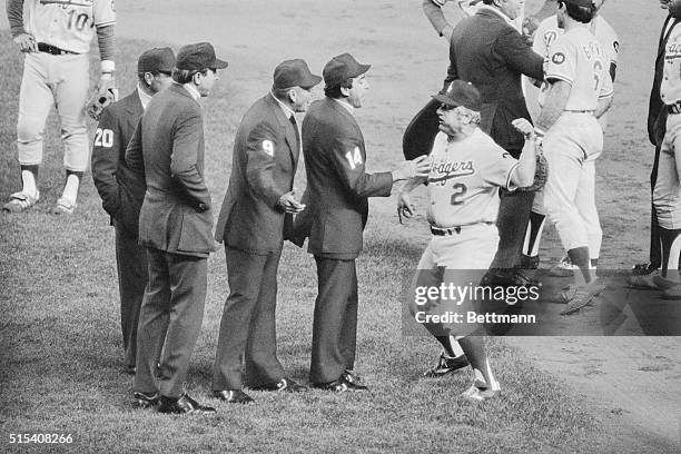 New York, New York: Dodger manager Tom Lasorda takes on four umpires as he protests call in the sixth inning of World Series, game four, October 14....