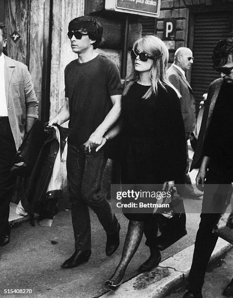 Rome, Italy-: French actress Catherine Deneuve walks with her groom David Bailey in Rome after their wedding.