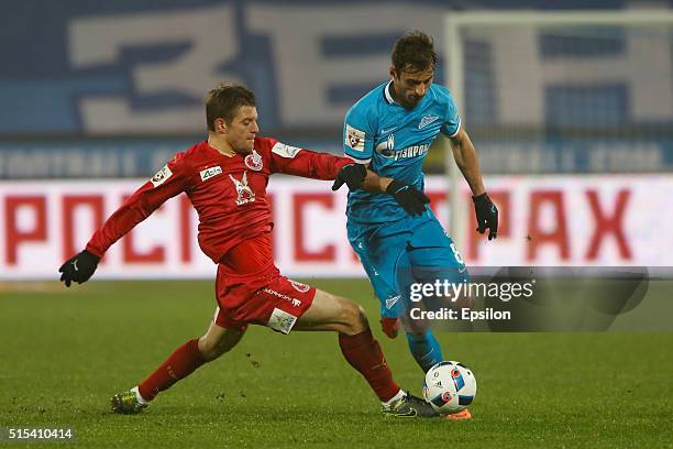 Mauricio of FC Zenit St. Petersburg and Ruslan Kambolov of FC Rubin Kazan vie for the ball during the Russian Football League match between FC Zenit...