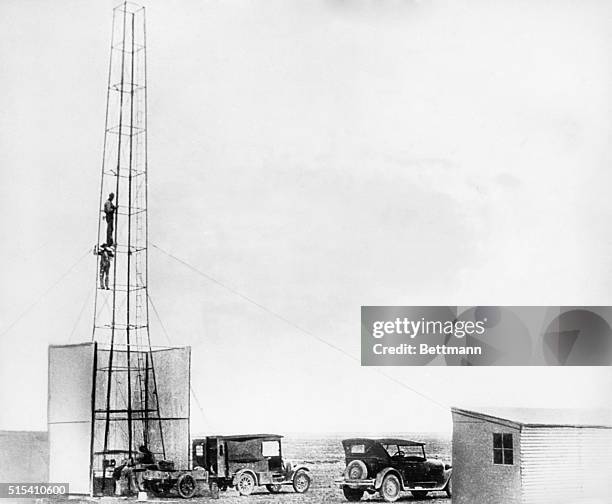Roswell, NM- From this 60-foot tower isolated 17 miles from town, Dr. Robert H. Goddard will fire a rocket designed to travel more than 30 miles into...