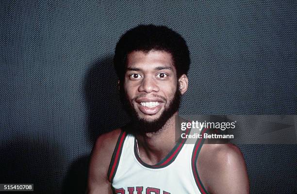 Close up of Kareem Abdul-Jabbar, basketball player for the Milwaukee Bucks smiling in his uniform. Color slide.