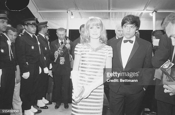 Cannes, France-: French actress Catherine Deneuve with her husband, David Bailey, arrive at the Festival Palace for the opening of the 20th Film...