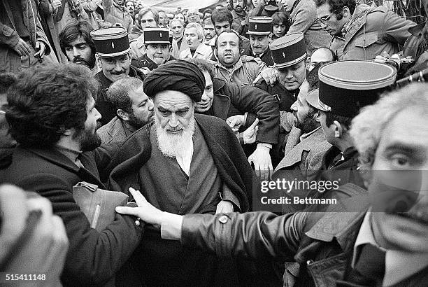 Neauphle le Chateau, France- Many faithful followers surround the Ayatollah Rudollah Khomeini , after the religious leader appealed to all Iranians...