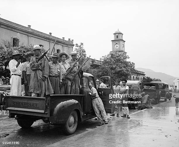 Chiquimula, Guatemala- Truckloads of followers of Colonel Carlos Castillo Armas are shown ready to leave for the front. These photos were made prior...