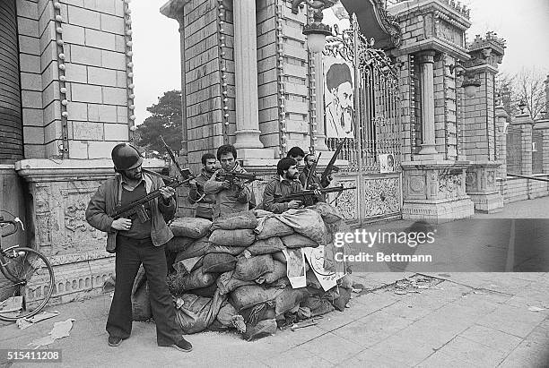 Tehran, Iran- Pro-Khomeini forces man a bunker in front of Iran's parliament building. They are expecting an attack from the Shah's elite troops,...