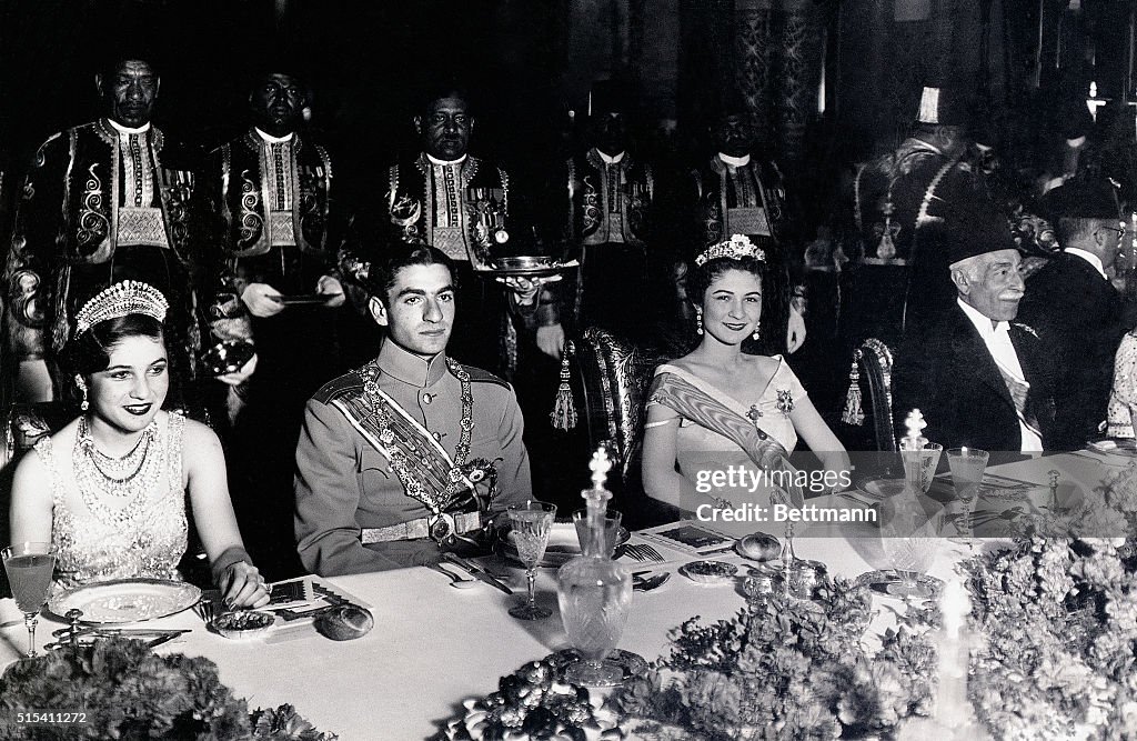 Mohamed Rida Crown Prince Mohamed Rida Chabour of Iran is shown seated between his ...