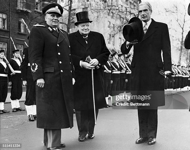 London, England- Marshal Josip Broz Tito, President of Yugoslavia, receives a warm welcome from Prime Minister Winston Churchill and Foreign...