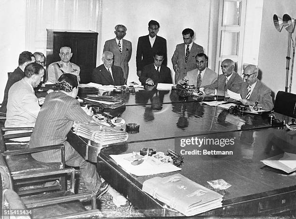 Tehran, Iran- Prime Minister Mohammed Mossadegh addresses, at an Iranian Cabinet meeting, the nationalization of the country's oil industry, the fate...