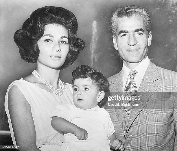 Shah Reza Pahlevi of Iran is shown with his wife, Queen Farah Diba, and their son, young Crown Prince Reza, in the latest portrait of the Iranian...