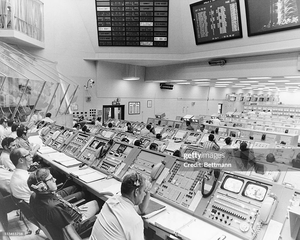 Apollo Launch Control Personnel in the Launch Control Center's Firing Room monitor the ...