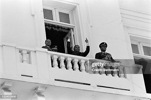 Port-au-Prince, Haiti-Jean Claude Duvalier, the 20-year-old officially-appointed heir to the Presidency of Haiti, waves to crowd estimated at 75,000...