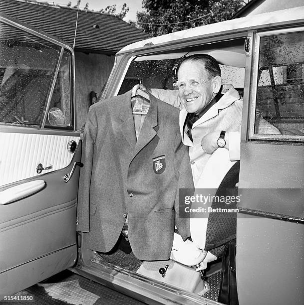 Karlsruhe, Germany-ORIGINAL CAPTION READS: Sepp Herberger, the trainer of the German national soccer team, smiles as he shows the jacket, May 10th,...