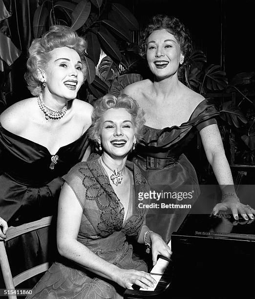 Hollywood, CA-Zsa Zsa , Eva and Magda Gabor , glamorous trio of sisters doing a night club stint at Ciro's, appear at an interview, during which they...
