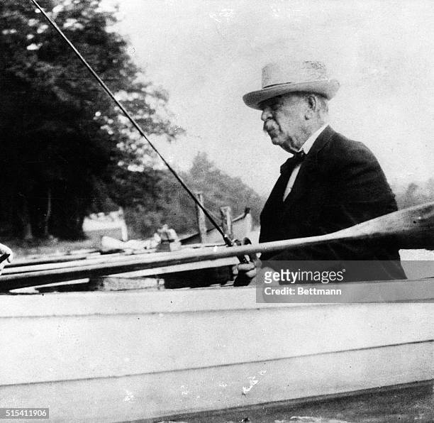 Former President Grover Cleveland fishing in canoe; closeup. Ca. 1904 photo.