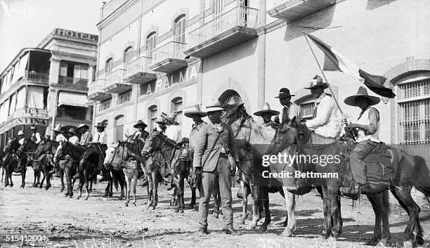 Tampico, Mexico-Photo shows the rebel cavalry after the capture of Tampico City Hall. The town is shown surrounded by rebels.