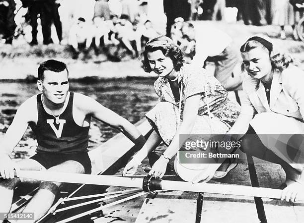 Henley-on-Thames, England- John B. Kelly, Jr., of Philadelphia, PA, son and namesake of a former Olympics rowing champion, gets a helping hand from...