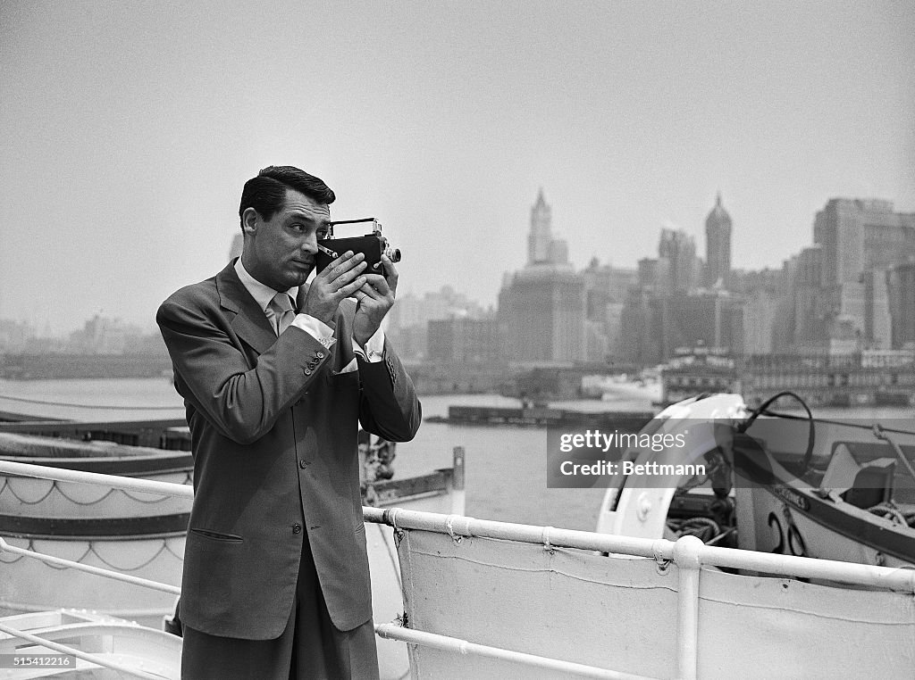 Actor Cary Grant Photographing New York Skyline