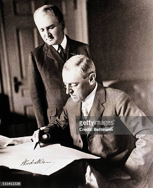 Signed photo of Woodrow Wilson and his Secretary, Joseph P. Tumulty. Filed 12/9/1954.