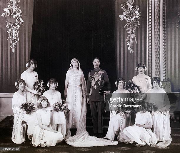 Photo shows the Royal Wedding group, with the Duke of York and his bride in the center. At the left are Lady Mary Cambridge, Lady Mary Thynne, the...