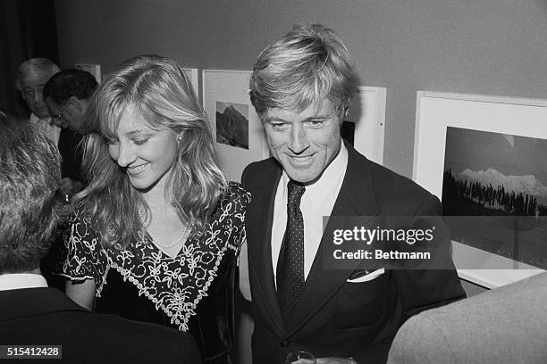 New York, NY-: Actor Robert Redford and his daughter, Shauna, attend an exhibit of mountain photographs at the International Center for Photography...