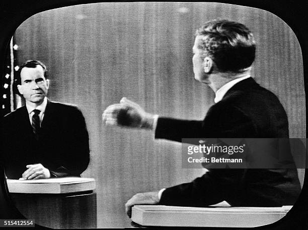 Television screen image of the presidential debates between Vice President Richard Milhous Nixon and Senator John F. Kennedy as Senator Kennedy makes...