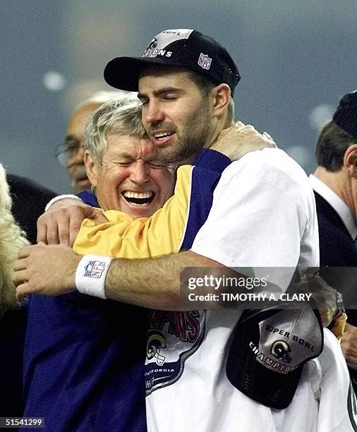 St. Louis Rams head coach Dick Vermeil and quarterback Kurt Warner embrace after the Rams defeated the Tennessee Titans 23-16 in Super Bowl XXXIV at...