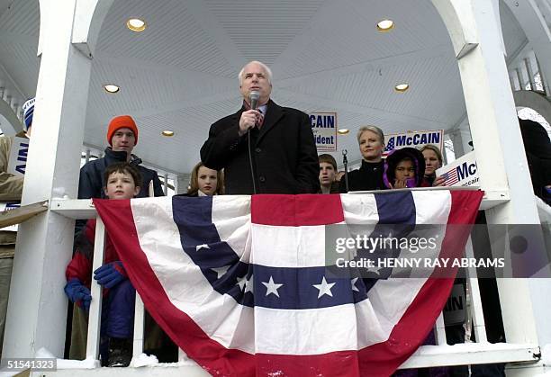 Republican presidential hopeful Sen. John McCain is surrounded by family members while addressing a rally in the central square of Keene, New...