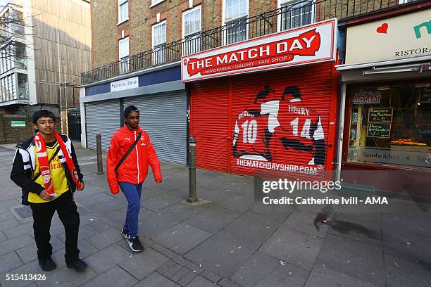 An image of Dennis Bergkamp and Thierry Henry of Arsenal on the shutter of the Matchday merchandise shop close to the stadium after the Emirates FA...