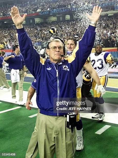 St. Louis Rams head coach Dick Vermeil raises his arms in victory after the Rams beat the Tennessee Titans 23-16 in Super Bowl XXXIV at the Georgia...