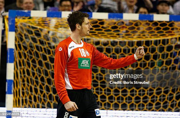 Goalkeeper Carsten Lichtlein of Germany celebrates during a international friendly handball match between Germany and Qatar at Max-Schmeling-Halle on...