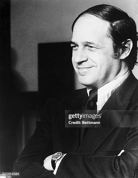 Pierre Boulez, French Composer and conductor of the New York Philharmonic Orchestra. He stands with his arms folded, smiling to the side of the...