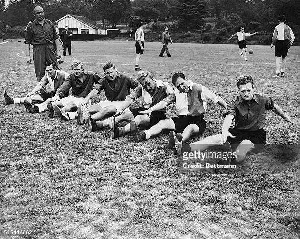 Month before being sent to Brazil to represent England in the World Cup, six members of the English soccer team train at Dulwich Hamlet's ground....