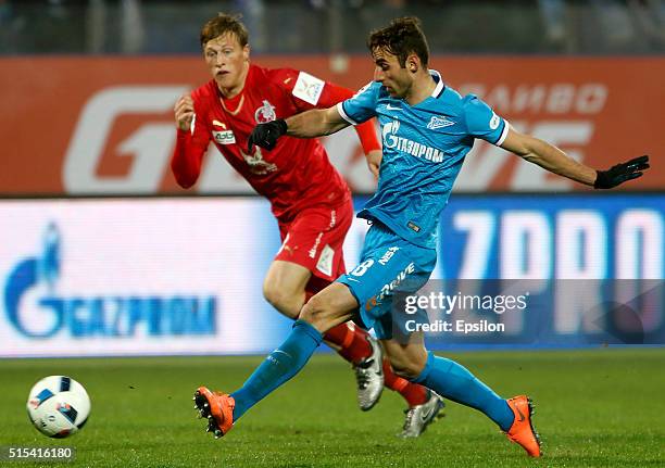 Mauricio of FC Zenit St. Petersburg and Emil Bergstrom of FC Rubin Kazan vie for the ball during the Russian Football League match between FC Zenit...