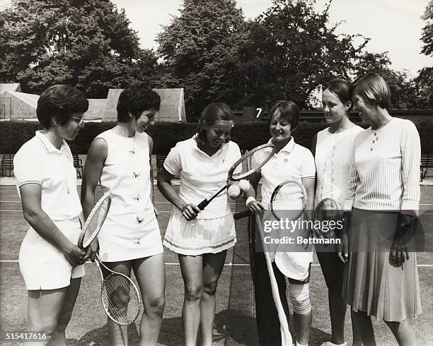 Members of America's Wightman Cup Team are pictured as they practiced at the All England Club at Wimbledon. Left to right are: Mrs. L. W. King; Miss...