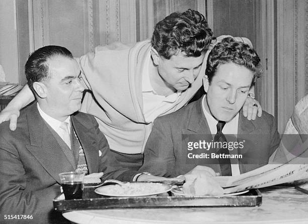 Pierre Poujade, a new right-wing power in French politics, is shown with two members of his party who became Assembly Deputies in the Poujadists...