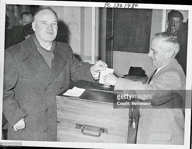 Maurice Thorez, head of the French Communist party, is shown as he cast his ballot in Sunday's general elections. France was rocked by the stunning...