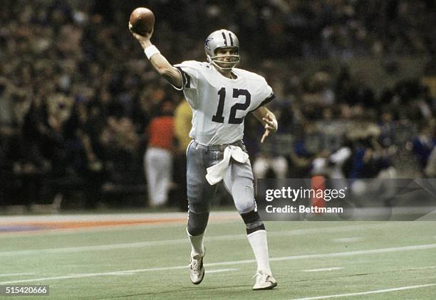 Dallas Cowboys' Roger Staubach throwing the football during Super Bowl game against the Denver Broncos in New Orleans.