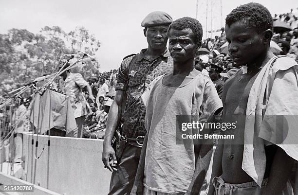 Kinshara, Zaire: Prisoners captured in the Shaba insurrection by the Zairean forces are led into the stadium of "20 Mai" where they were put on...