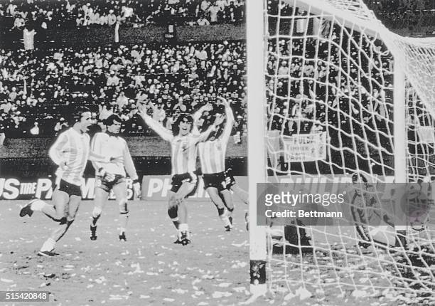 World Cup Final. Mario Kempes of Argentina raises arms in jubilation after scoring 2-1 goal against Holland in extra time of 1978 Football World Cup...