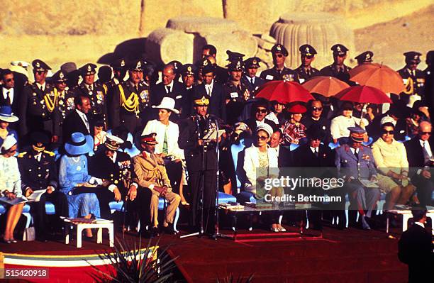 Paragade: The Shah speaks at the opening of the parade. Left to right in the front row: Fabiola and Baudouin of Belgium, Ingrid and Frederick of...