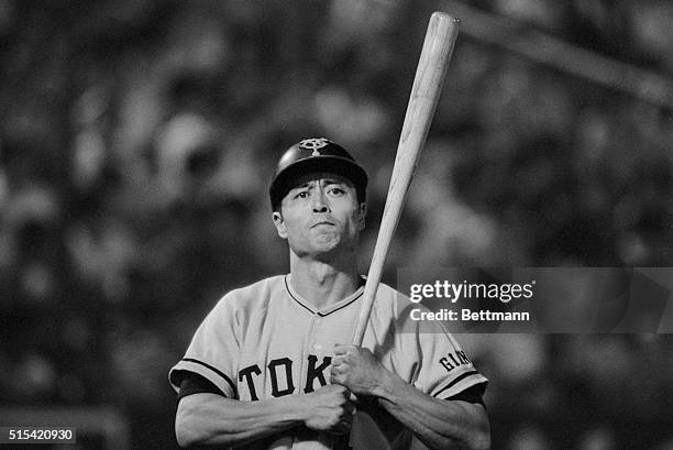 Japan's home run king, Sadaharu Oh of the Yomiuri Giants, grabs his bat to go in to the batter box during Giants-Yakult Swallows game here 8/27. Oh,...