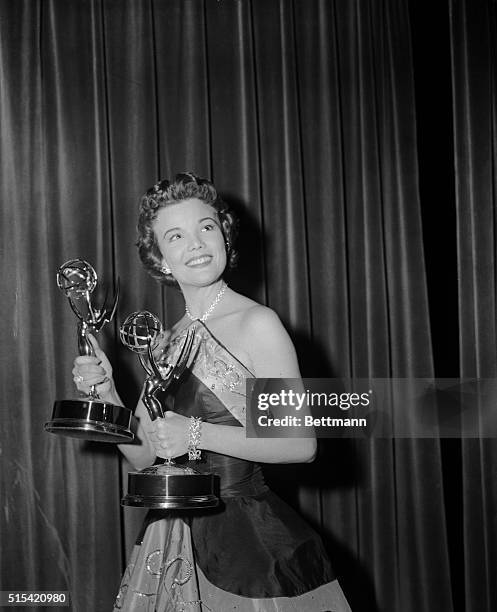 Nanette Fabray holds her Emmys after presentation by the Academy of Television Arts and Sciences tonight at the Waldorf Astoria Hotel. Nanette won...