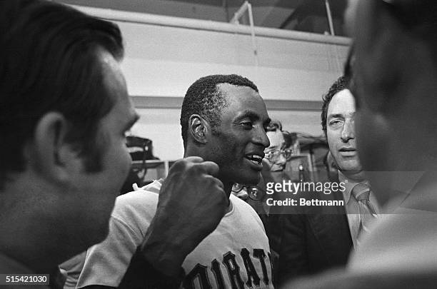 Outstanding star of the 1971 World Series, the Pirates Roberto Clemente looks like a happy man in the Pirates' dressing room 10/17 after the Pirates...