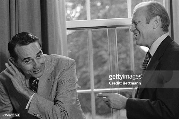 Washington: A remark by Pres. Ford amuses his running mate, Sen. Robert Dole, as the two men met at the White House to discuss campaign matters,...