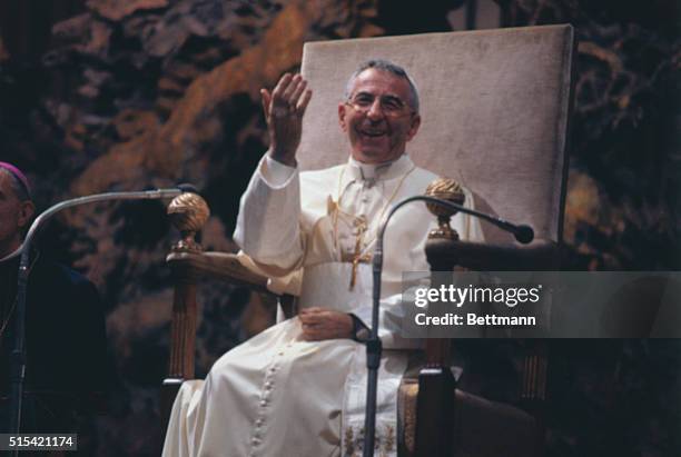 Vatican City: Newly elected Pope John Paul I waves to crowd in St. Peter's Square, from the window of his private study in the Apostolic Palace after...
