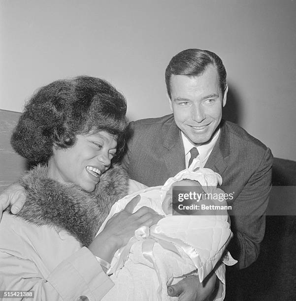 Singer Eartha Kitt and her husband, real estate man William McDonald are all smiles as they debut their 4 day old baby girl as they left Cedars of...