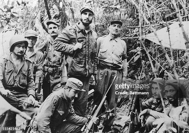 This photo, filed June 1957, is believed to be the only existing one of Fidel Castro, leader of Cuba's revolutionary forces, and members of his staff...