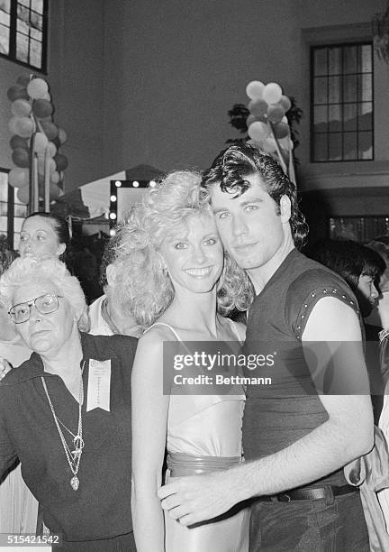 John Travolta and Olivia Newton John attend a party following the gala premier of their new movie, Grease. The party was held on a Paramount sound...