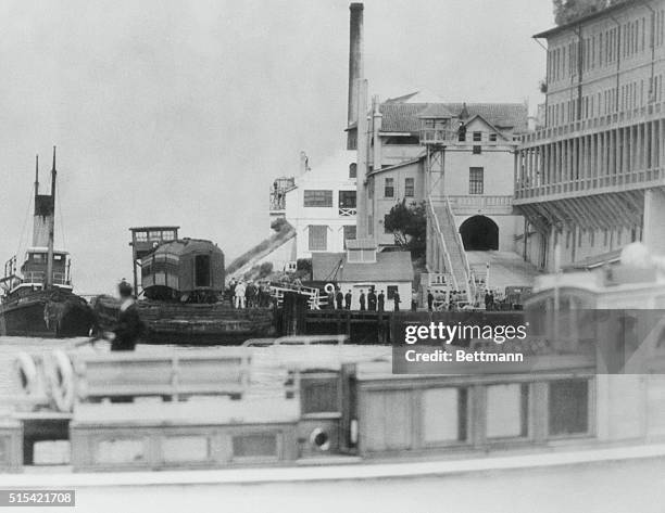 Prisoners upon boats that will transport them to the notorious California state penitentiary on Alcatraz Island, near San Francisco Bay.